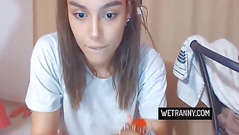 Busty shemale with tattoo on her face is showing herself