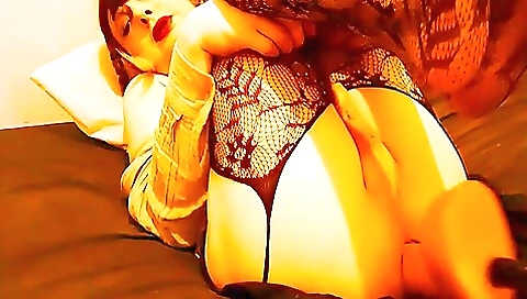 Beautiful petite brunette with big tits is playing with her clit