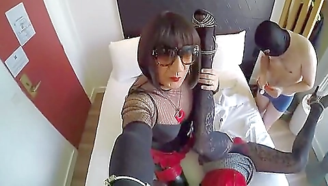 Busty brunette gets facial cumshot after crossdressing