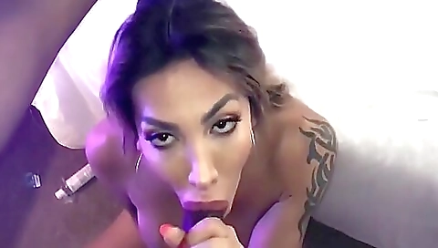 Brunette pornstar sucks black man's cock in deepthroat