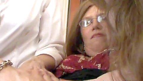 Busty mature step mom is giving a blowjob and a handjob