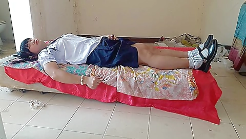 Asian teen in school uniform shows off her cute body